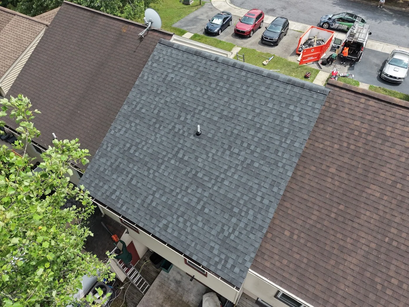 Dark shingle roof photographed from above