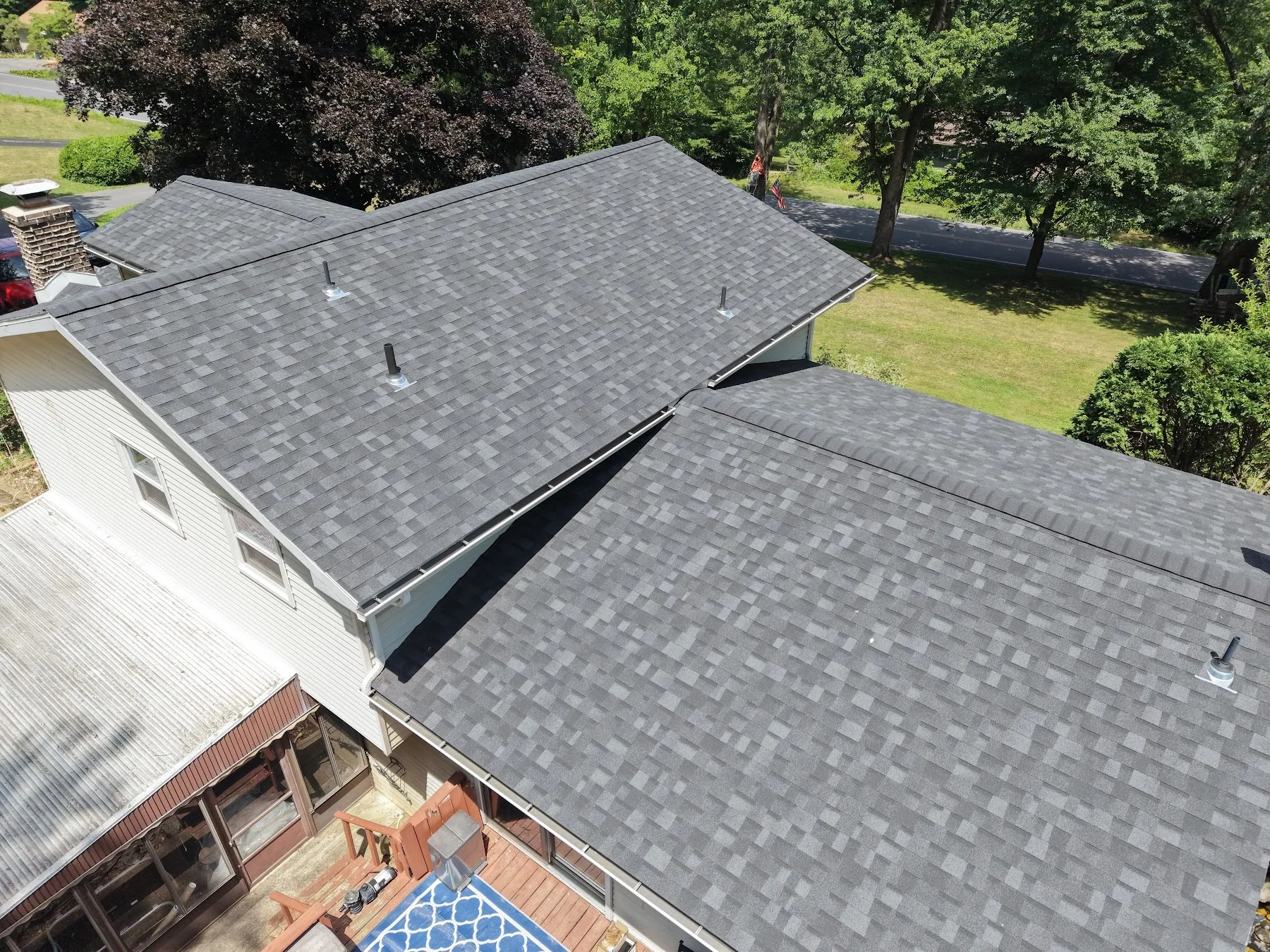 Close view of dark shingle roofing