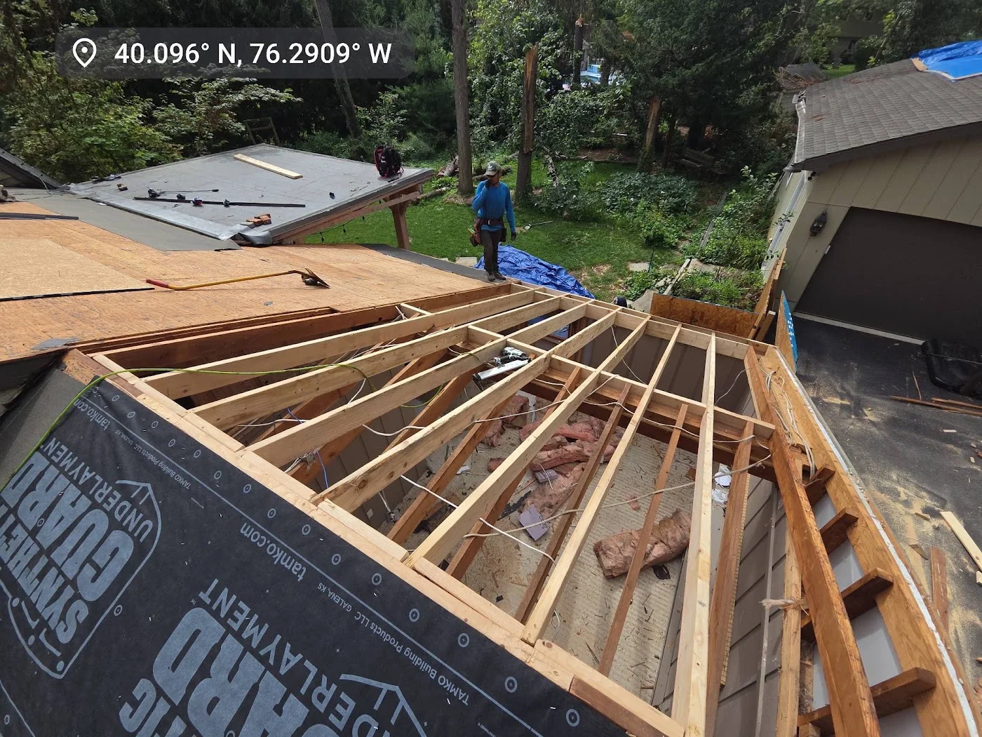 Wooden porch roof framing from above